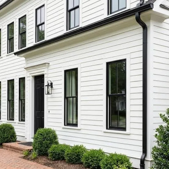 Detailed exterior house painting and finished architectural trim